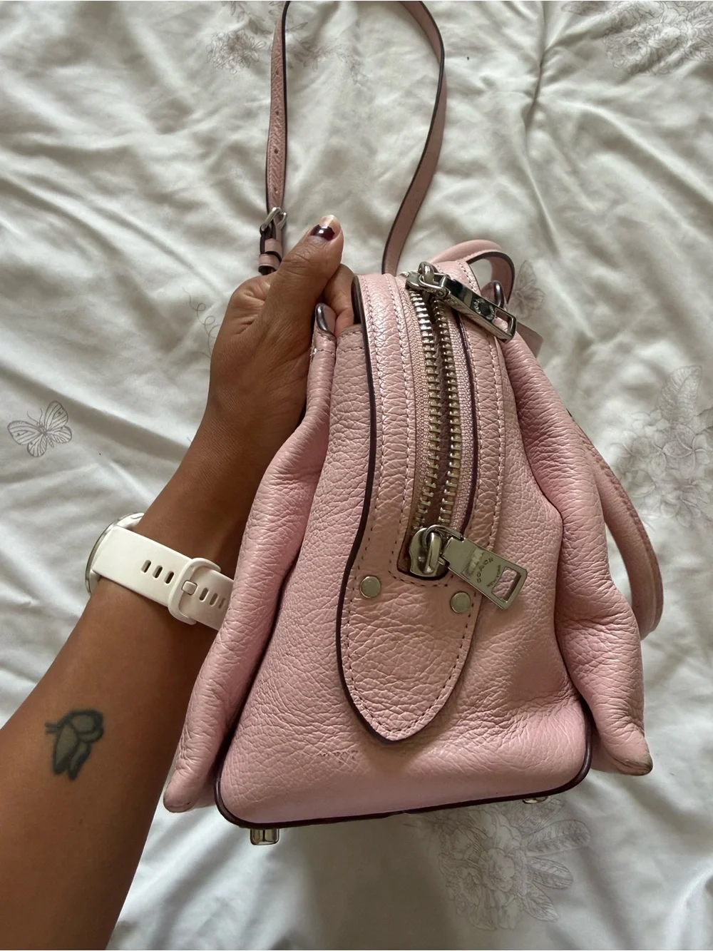 Coach compact pebbled